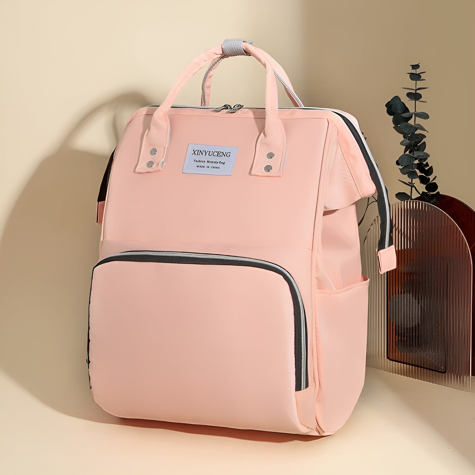Spacious_diaper_backpack_for_newborn_essentials__Pink