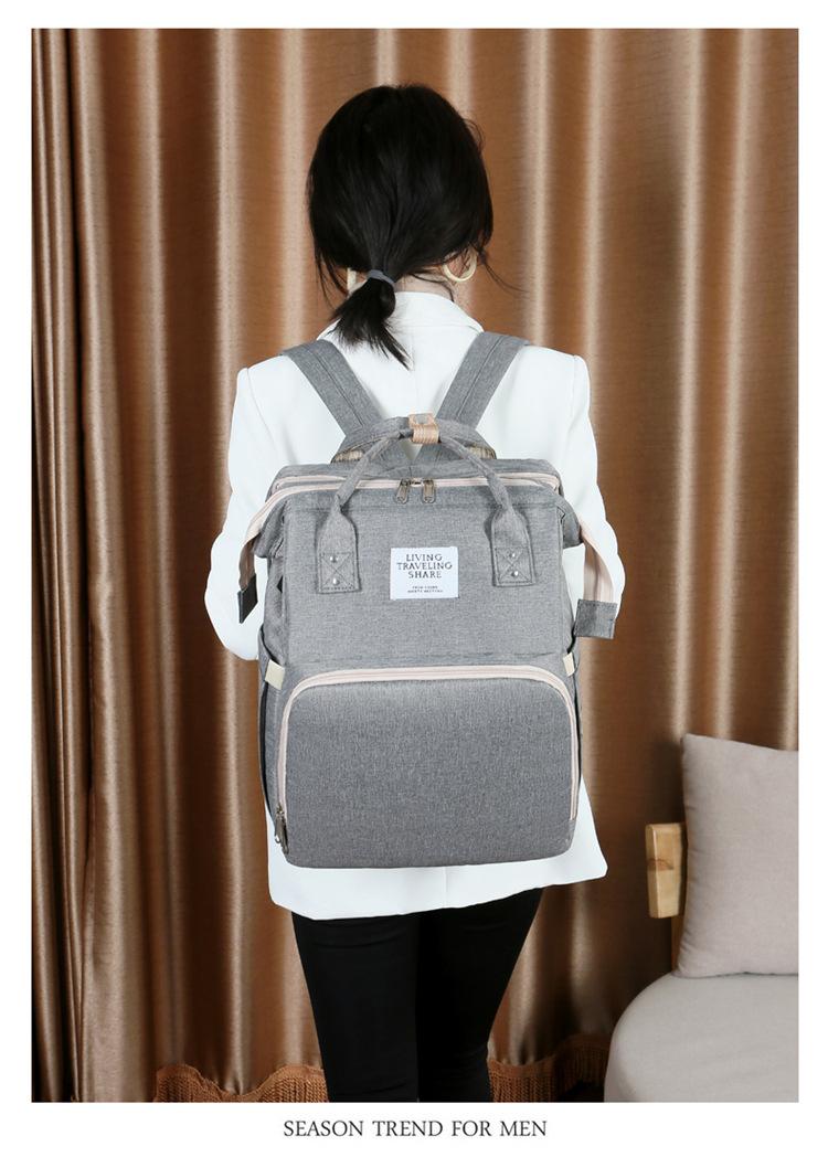 Trendy_black_diaper_bag_for_baby_care_feeding_and_travel__Gray